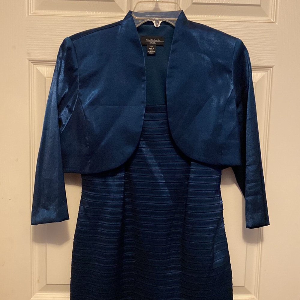Navy blue sleeveless dress with jqcket